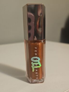Fenty Beauty Shimmer Gloss in Metallic Bronze